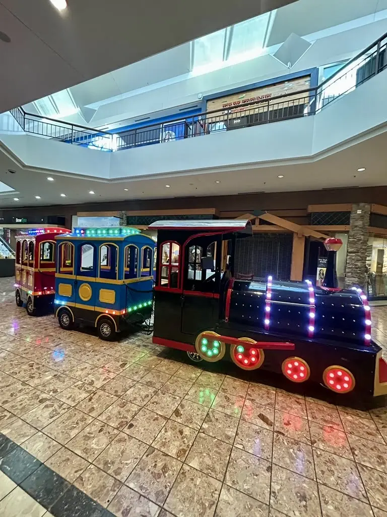 Fun Express locomotive and passenger cars in a mall common area
